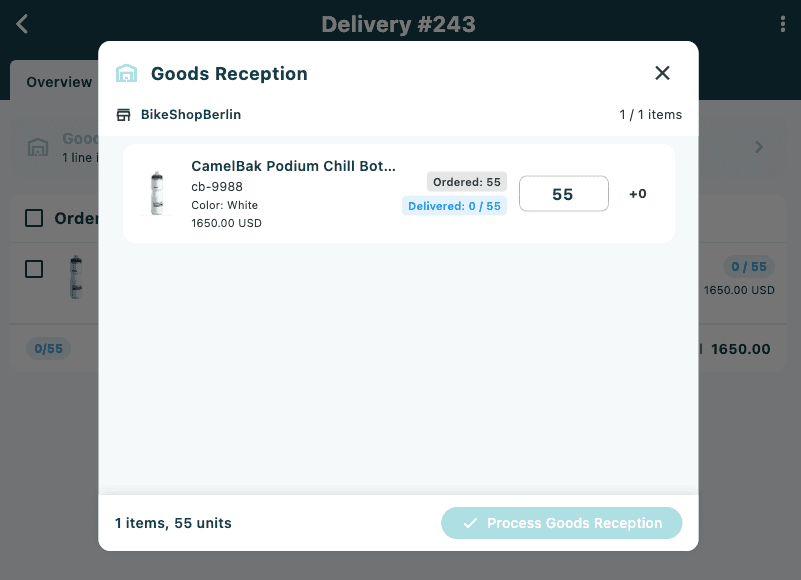 The Goods Reception screen showing delivery line items with receive quantity fields and the Process Goods Reception button